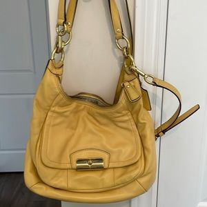 Coach purse - cross body and shoulder - color is buttercomb
